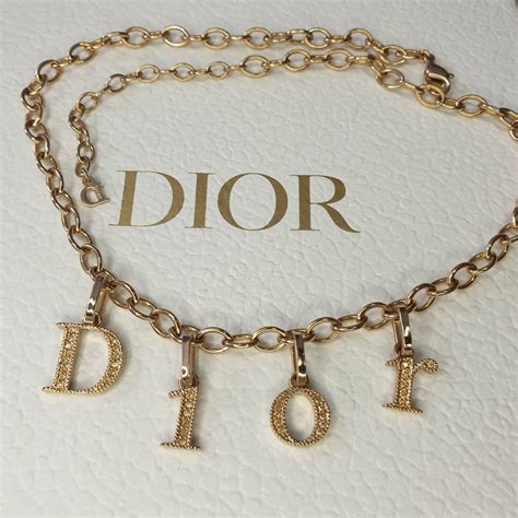 dior dange letter necklace|christian Dior letters necklace.